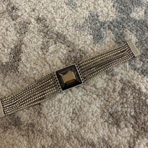 Silver bracelet with black centrepiece